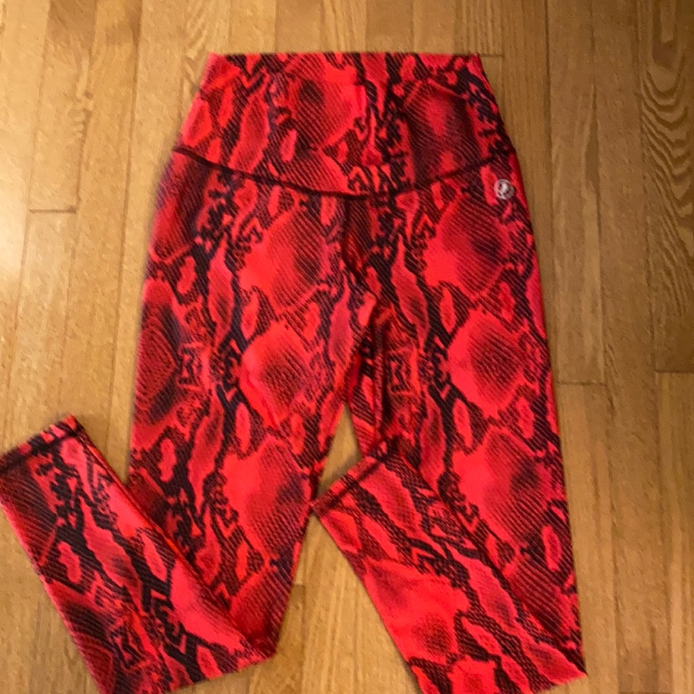 Red snake print leggings